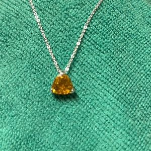 Woman’s 18 inch necklace with yellow stone